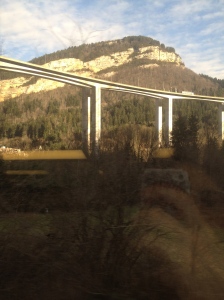 Zooming past the Jura and a mountain highway. 